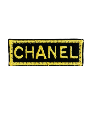 Small black gold embroidered patch